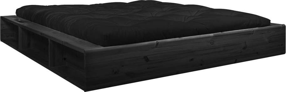 Černá dvoulůžková postel z masivního dřeva s úložným prostorem a černým futonem Comfort Karup Design Ziggy
